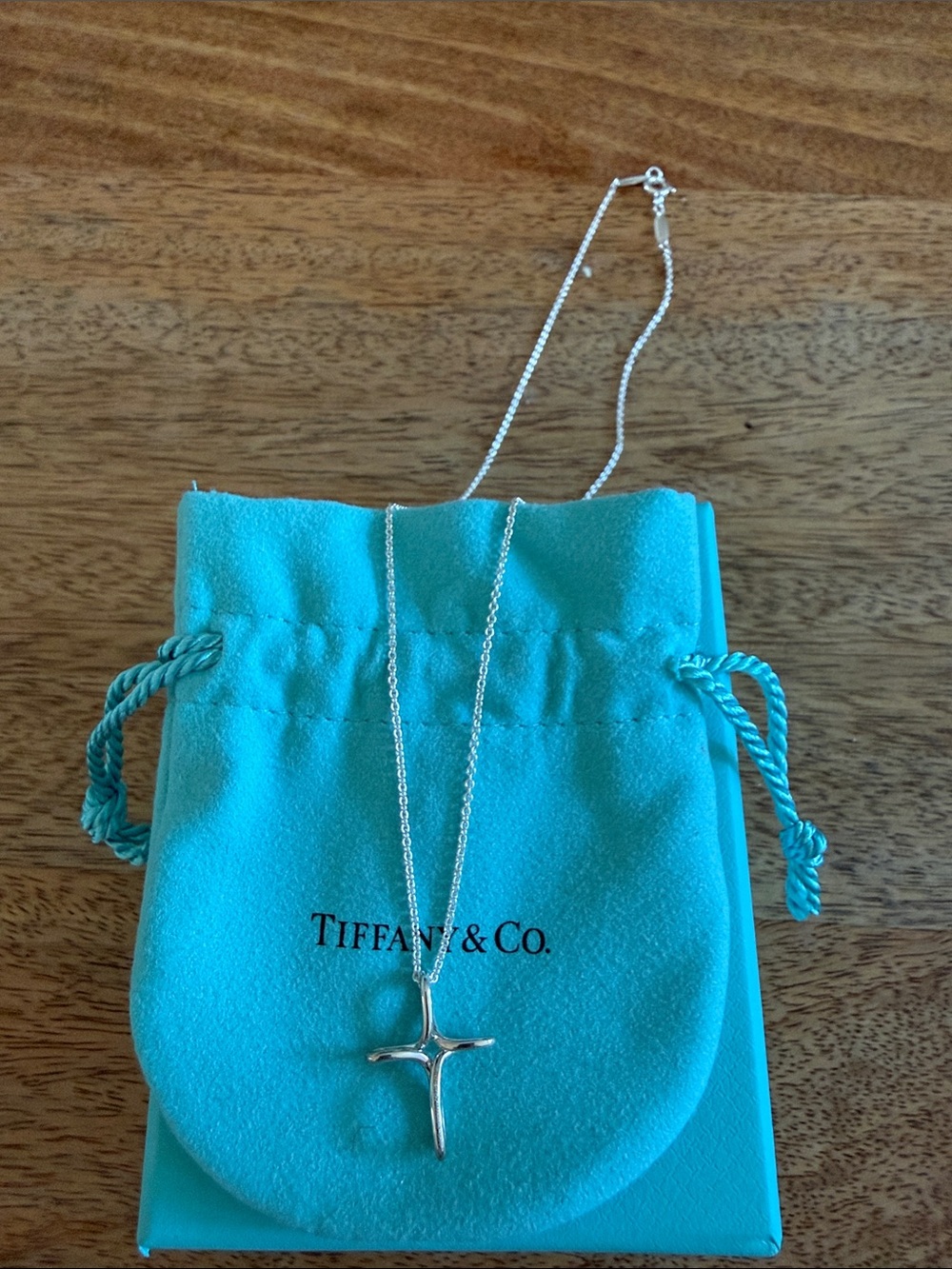 Tiffany & Co. Sterling Silver Cross Pendant with Blue Pouch